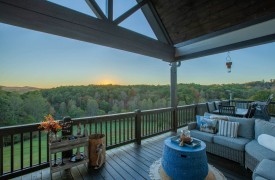 Skyfall | Cabin Rentals of Georgia | outdoor living area with seating overlooking the expansive view
