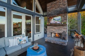 Skyfall | Cabin Rentals of Georgia | Outdoor living area with fireplace and TV