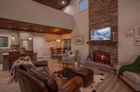 Skyfall | Cabin Rentals of Georgia | Open-concept main floor with kitchen, dining, and living room connected