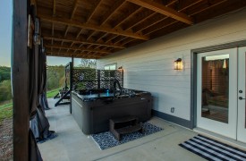 Skyfall | Cabin Rentals of Georgia | Terrace Level Outdoor deck with hot tub