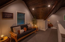 Skyfall | Cabin Rentals of Georgia | Loft with futon and reading nook