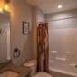 BathroomSharedByTerraceLevelwithsinglevanityandtub/showercombination