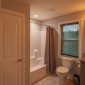 UpstairsQueenensuitebathroomwithsinglevanityandtub/showercombination